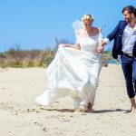 cruise wedding - bride and groom on beach
