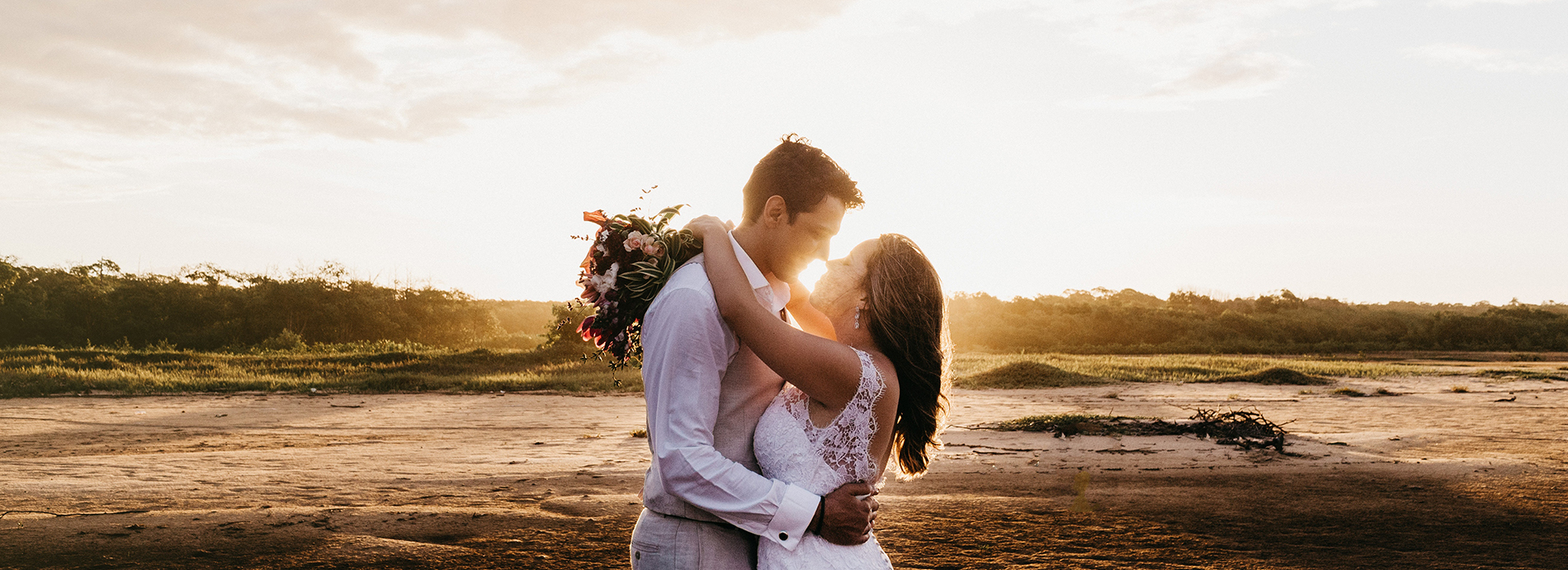 bride and groom embrace