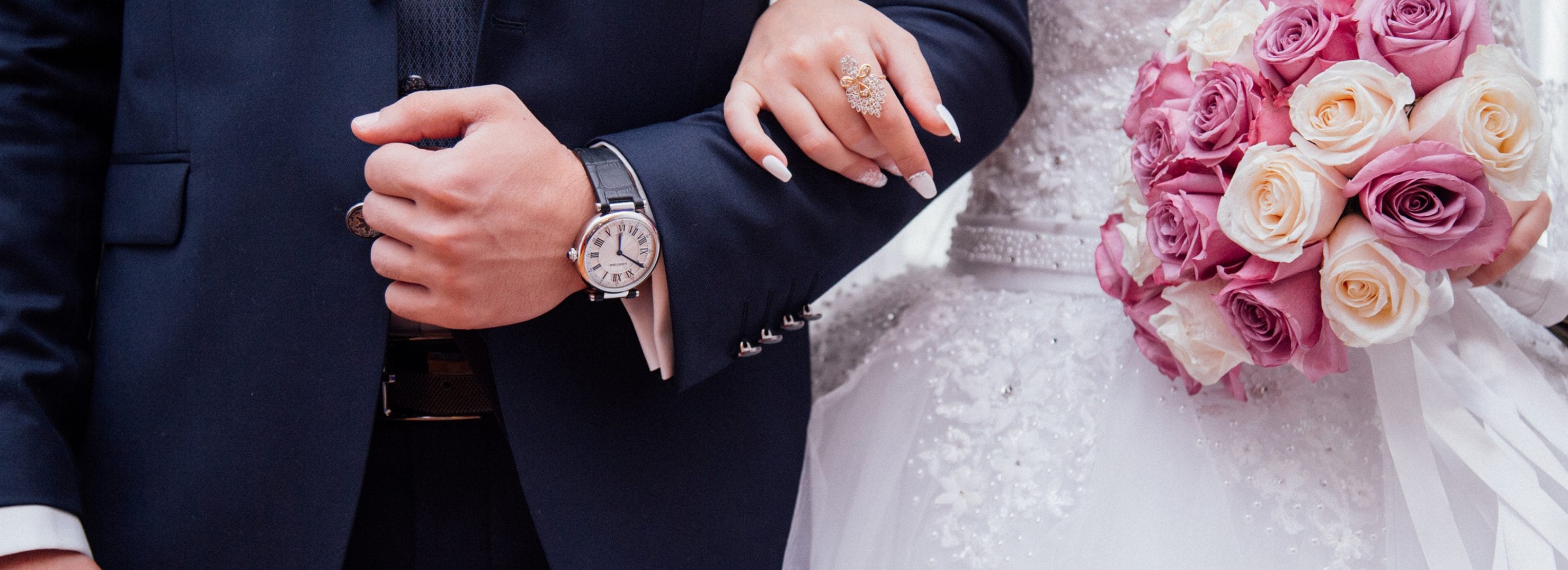 groom's suit and bride's wedding dress