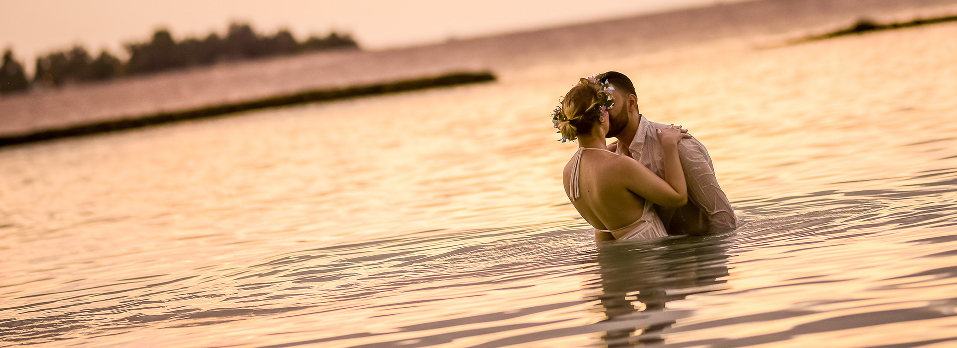 bride and groom in sea